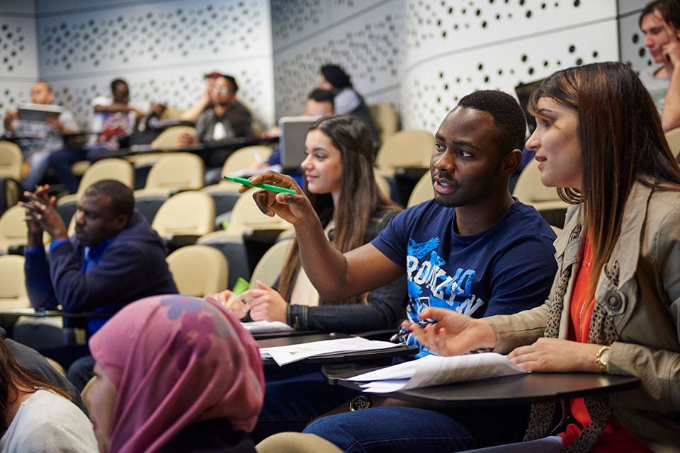 Students sit in lecture hall at Western Sydney University, Penrith. 