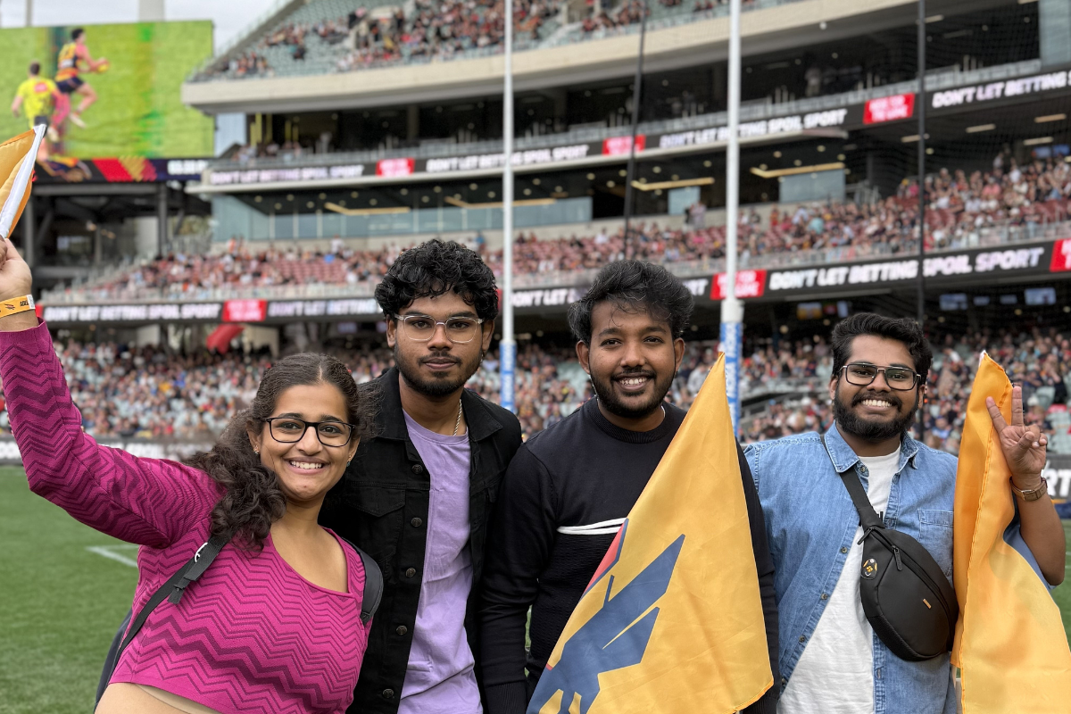 International students at a game of AFL in Adelaide