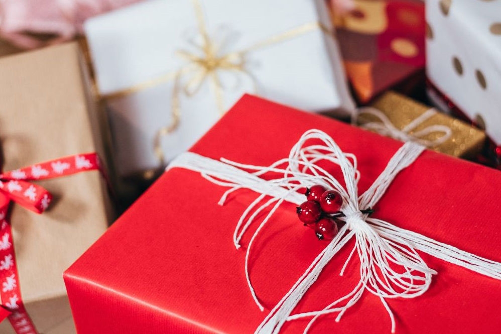 A closeup of wrapped Christmas presents.