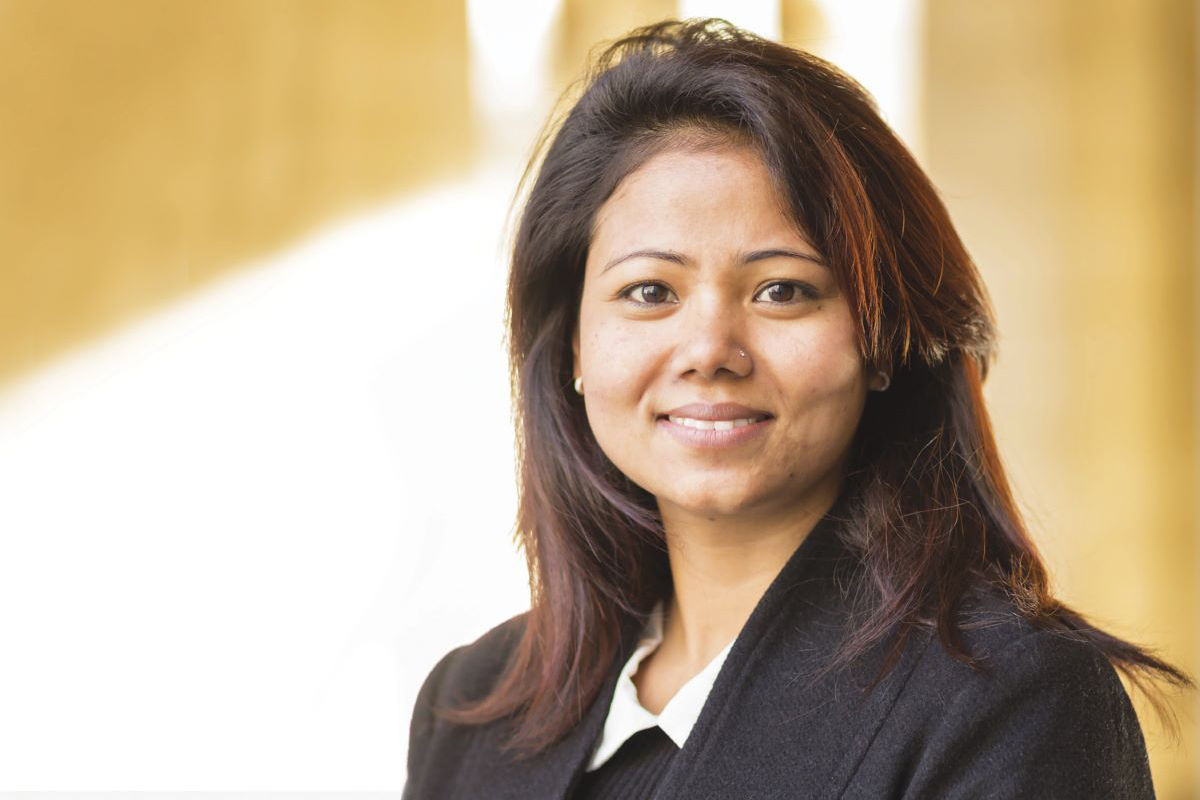 Radhika, a smiling female international student from Nepal.