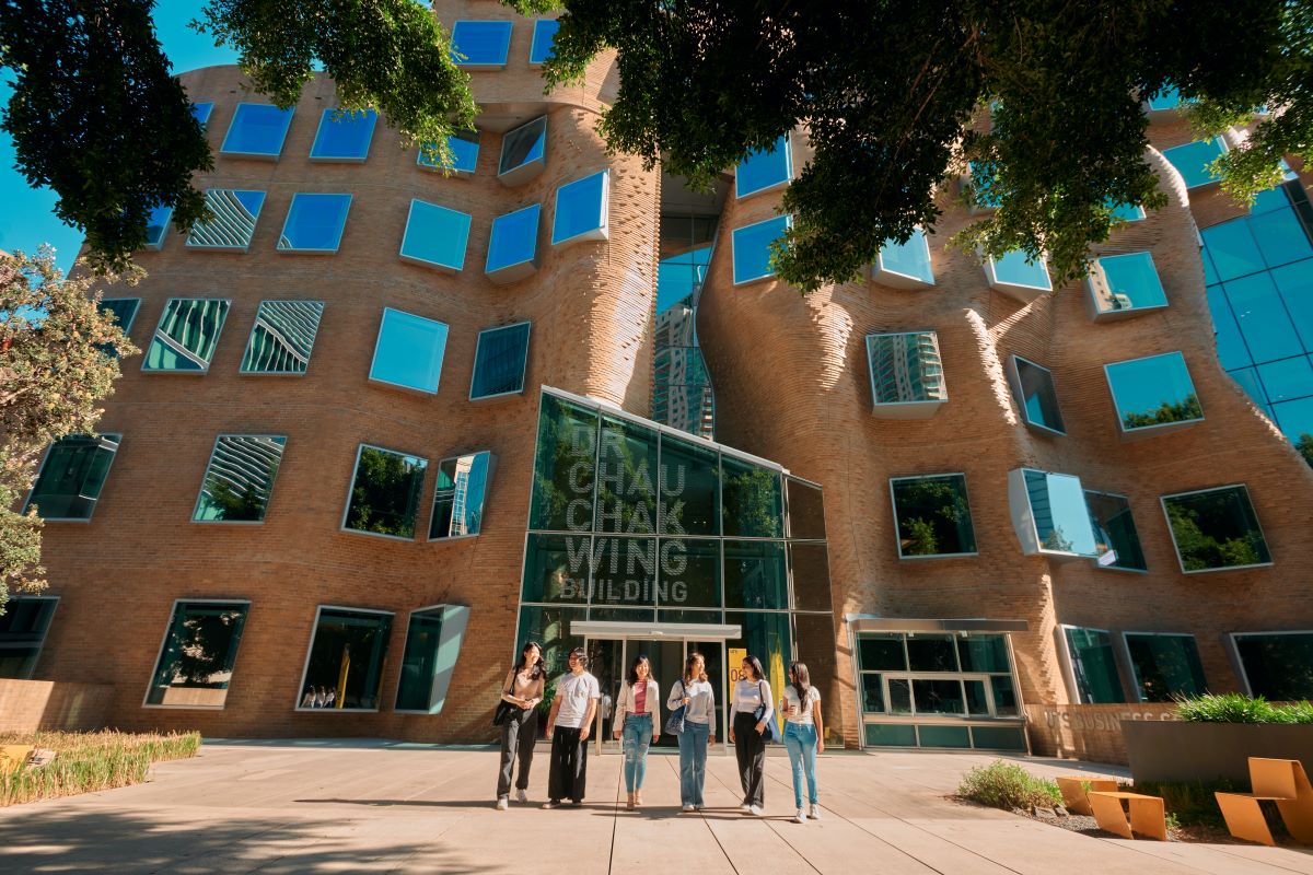 Students walking out of their university building 