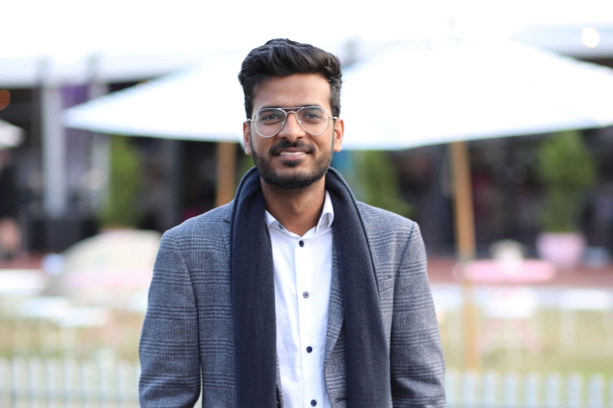 Headshot of Devendra from India smiling