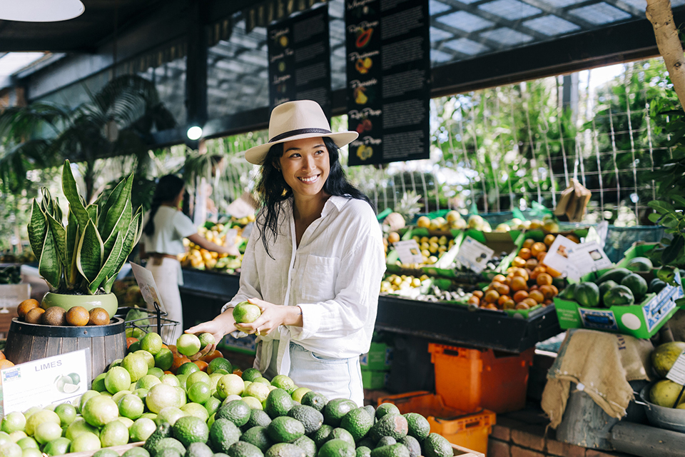 Female student getting coffee with a friend at the campus cafe. 